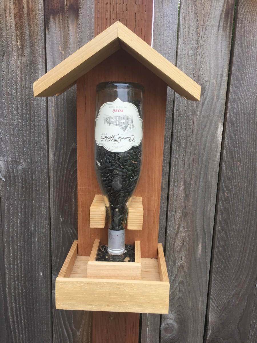 Cedar wine bottle bird feeder